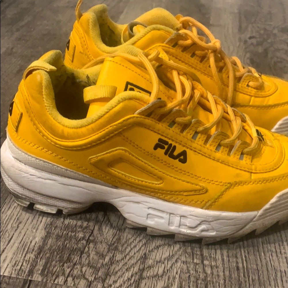 Bright yellow Fila’s